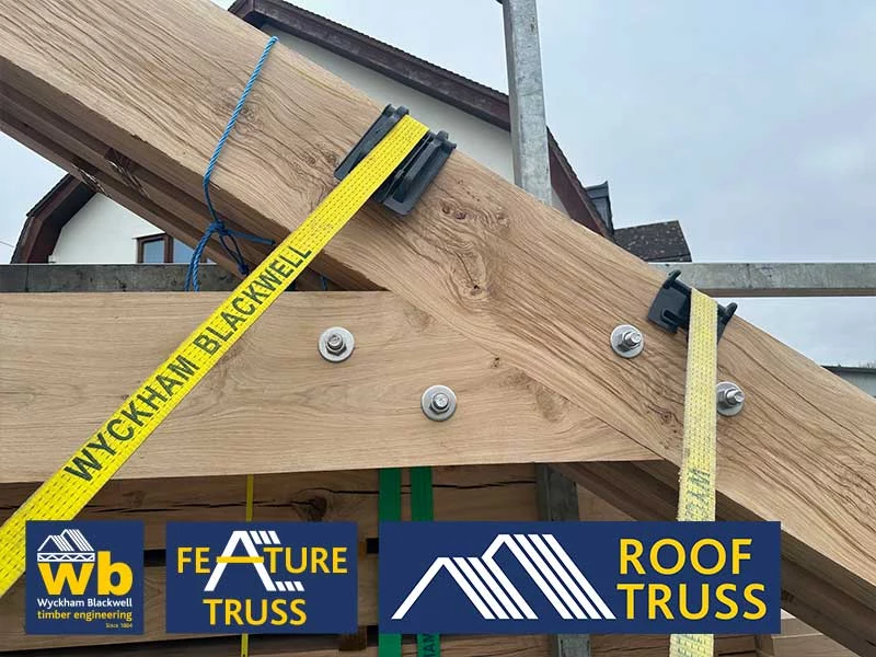 wood strapped to lorry