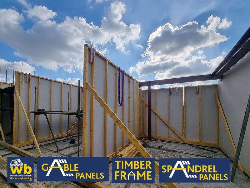 Timber frame structure on building site
