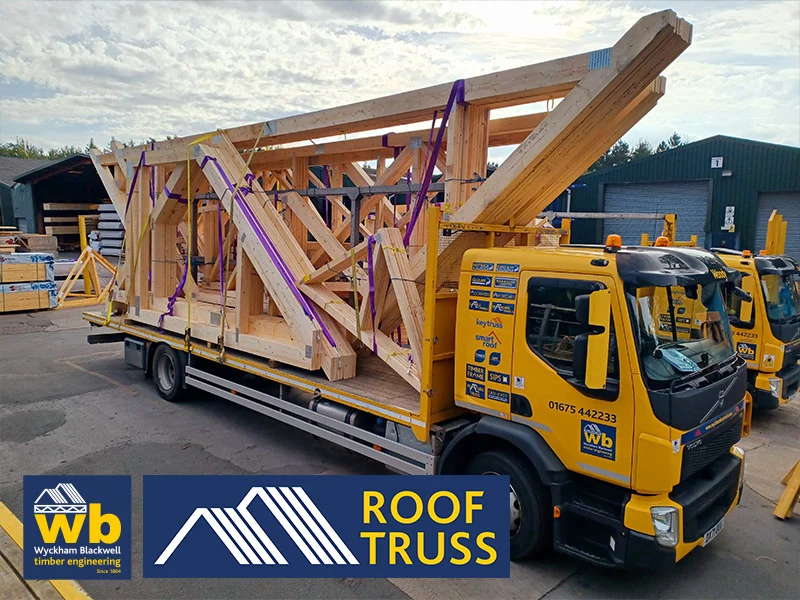 Large attic truss on back of flatbed lorry