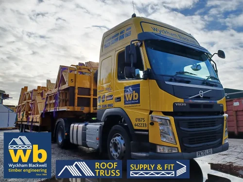 A Wyckham Blackwell branded, articulated flatbed lorry transporting two full loads of roof trusses to a client in Bedford.
