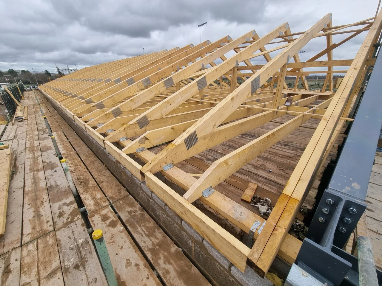 Roof trusses on back of flat bed lorry