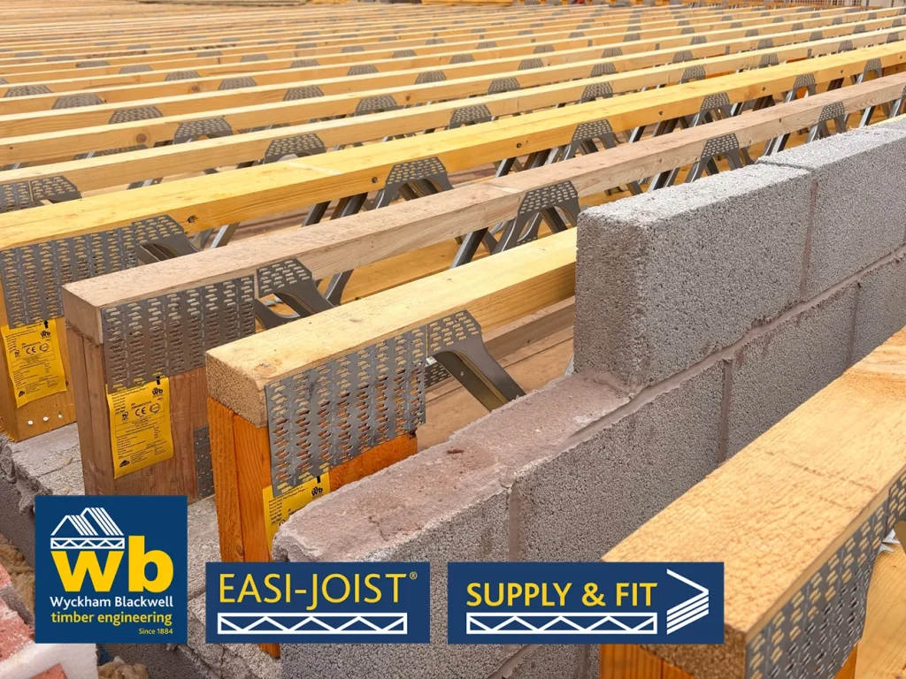 Rows of Easi-Joist Metal Web Joists around a breeze block wall.