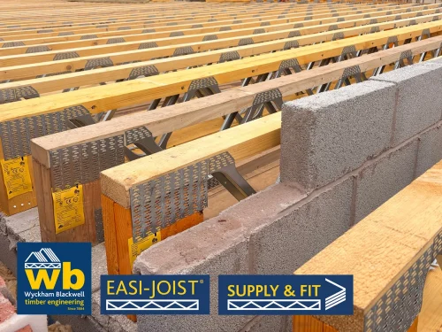 Rows of Easi-Joist Metal Web Joists around a breeze block wall.