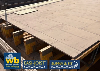 Rows of Easi-Joist Metal Web Joists under boards.